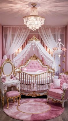 a baby's room with pink and gold furniture, chandelier and canopy bed