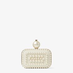 Our MICRO CLOUD handbag is crafted in Italy from white suede. The little sister to the CLOUD Clutch, our mighty mini is embellished with all-over pearls and topped with a statement-making pearl and crystal clasp. Keep yours close and cue compliments Jimmy Choo Clutch, Clutch Bag Wedding, Designer Clutch Bags, Suede Clutch, Bridal Bag, Jimmy Choo Bag, Wedding Clutch, Designer Clutch, Bridal Clutch