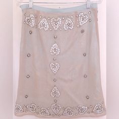 Nwt Tracy Reese Skirt Crystal Embellished Mesh Over Silk Floral Underskirt Crystal Embellished Heart Motif Nude Mesh Outer Skirt Aqua Silk Over Skirt Contrasting Waistband Hidden Side Zipper Tags Intact Replace Crystals/Beads Included Flat Measurements: Waist- 14.5” Length- 23” Nwt Gorgeous Condition - New With Tags - Never Worn Pet Free. Smoke Free. Festive Embellished Long Skirt, Glamorous Long Skirt For Festive Occasions, Glamorous Long Festive Skirt, Festive Embellished Cocktail Skirt, Embellished Fitted Long Skirt, Embellished Evening Pencil Skirt, Elegant Embellished Pencil Skirt, Glamorous Embellished Long Skirt, Glamorous Long Embellished Skirt