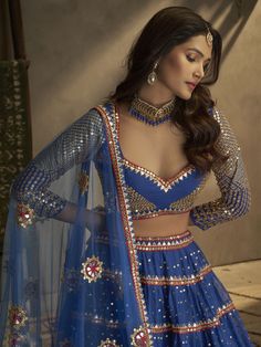 Buy mystical blue georgette embroidered lehenga choli for celebrating upcoming diwali festival celebration. Shop this breathtaking lehenga choli which comes with georgette blouse and georgette dupatta. Blue Sheer Dupatta Set For Navratri, Blue Sharara For Navratri Festival, Blue Sharara For Navratri Festive Occasion, Blue Sharara For Navratri Festivities, Blue Sharara For Diwali Festivities, Blue Palazzo Set With Unstitched Blouse For Eid, Blue Georgette Sharara For Reception, Blue Georgette Palazzo Set With Mirror Work, Blue Palazzo Set With Unstitched Blouse For Diwali