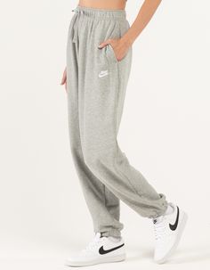 NIKE Sportswear Club Womens Oversized Fleece Sweatpants - HEATHER GRAY | Tillys Comfy Jogging Pants, Moisture-wicking Full-length Sweatpants For Loungewear, Nike Moisture-wicking Fleece Joggers, Nike Relaxed Fit Moisture-wicking Joggers, Nike Athleisure Sweatpants With Comfort Waistband, Nike Comfortable Joggers For Sports, Comfy Sports Bottoms With Elastic Waistband, Nike Fleece Activewear With Elastic Waistband, Nike Sportswear Sweatpants For Jogging