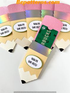 four pieces of craft paper with labels on them that say, you're the best