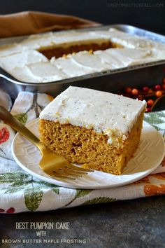 a piece of pumpkin cake on a plate with a fork in front of the cake