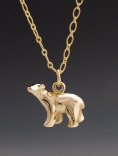 "This 14 k gold polar bear is really a tiny sculpture based on my 15\" long bronze sculpture . It is solid and measures 11/16 long and 1/2 in tall. it is available in rose or white gold. purchase chains separately.. ( see chain listings )" Polar Bear Jewelry, Bear Necklace, Bear Pendant, Glass Marbles, Bronze Sculpture, Polar Bear, Pendant Necklaces, Metal Working, Gold Necklace