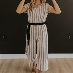 Never Worn (No Tags) Roolee Jumpsuit. Super Cute Short Sleeve Cream And Tan Vertical Stripped With Black Tie. Zipper Back. No Flaws. Bought Final Sale And Doesn’t Fit Me. Chic Neutral Jumpsuits And Rompers For Spring, Chic Neutral Spring Jumpsuits And Rompers, Beige V-neck Jumpsuit For Day Out, Casual Cream Jumpsuits And Rompers For Loungewear, Chic Beige Relaxed Fit Jumpsuits And Rompers, Summer Cream Overall Jumpsuits And Rompers, Chic Beige Jumpsuits And Rompers With Relaxed Fit, Beige V-neck Jumpsuits And Rompers For Day Out, Chic Beige Jumpsuit With Relaxed Fit