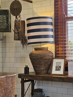 a lamp sitting on top of a wooden table