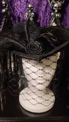 Beautiful Black Velvet Victorian Inspired Hat with a Black Rose and Black Feathers. This listing is with a veil. Available without a veil as well. Perfect for dressing up, formal events, Vampire Balls, and cosplay. Other styles are available in all colors. Message me for a custom order. Made in a pet friendly studio. Made to order. 3 to 5 days creation time. Check out my other listings: Black Velvet Victorian with Tassels: https://www.etsy.com/listing/1197594531/black-velvet-formal-hat-velvet-top-hat Silver Victorian: https://www.etsy.com/listing/1293744756/victorian-hat-edwardian-hat-downton Mauve Victorian:  https://www.etsy.com/listing/1293745798/mauve-velvet-hat-formal-hat-red-top-hat Burgandy Victorian:  https://www.etsy.com/listing/1094341893/victorian-hat-edwardian-hat-downton Turqu Diy Victorian Hat, Black Wide Brim Top Hat For Costume Party, Black Formal Costume Hat With Curved Brim, Formal Black Costume Hats With Curved Brim, Black Formal Hats For Halloween, Black High Crown Hat For Evening, Formal Black Wide Brim Costume Hat, Formal Black Brimmed Costume Hats And Headpieces, Vintage Black Costume Hat With Curved Brim