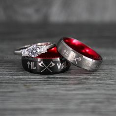 two wedding rings with roman numerals on them