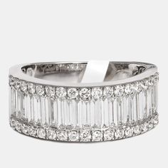 a white gold ring with baguetts and diamonds