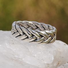 Braid Silver Band Ring * 100% polished solid sterling silver * Solid sterling silver weight: approx. 8 Grams * Band Width: 7.5 mm / 2.95 in  * Crafted and polished by hand * .925 trademark stamp Sterling Silver *  RE0078-RAIN-8 Fact Discover our stunning 925 sterling silver braided ring. Handcrafted with precision, this boho-inspired ring combines beauty and elegance. The intricate braided design symbolizes infinity and eternity, adding a touch of meaning to your style. Made from high-quality ma Silver Braided Ring, Boho Braid, Infinity Braid, Pentagram Pendant, Woven Ring, Scandinavian Jewelry, Snake Ring Silver, Braided Ring, Pattern Ring