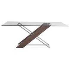 a glass and wood table with an x design on the top, in front of a white background