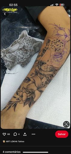 a person with a tattoo on their arm next to a leopard and flowered design