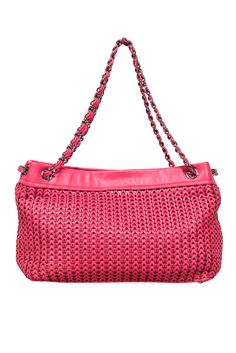 Add a pop of color to your outfit with this hot pink woven leather shoulder bag from Chanel. The silver woven chain adds a touch of elegance, making it the perfect Barbie dream bag. Say goodbye to boring purses and hello to fashion-forward fun! Made in Italy 100% Leather Fabric lining Magnetic button top closure One interior zipper pocket Date code: 988092 Minor wear on lining Height 8.75" Width 11.5" Depth 4.75" Handle drop 10" Luxury Pink Shoulder Bag With Intrecciato Weave, Pink Rectangular Woven Leather Shoulder Bag, Chic Pink Woven Leather Shoulder Bag, Pink Woven Leather Tote Shoulder Bag, Chic Pink Woven Leather Bags, Pink Woven Leather Bag, Dream Bag, Woven Chain, Pink Chanel