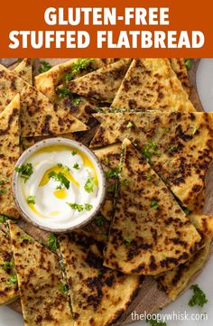 gluten - free stuffed flatbread on a plate with sour cream