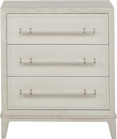 a white dresser with three drawers and two pulls on the bottom drawer, in front of a white background