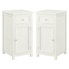 two white nightstands side by side with doors and drawers on the sides, one is closed