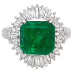 This exquisite 3.32 Carat Emerald is truly a captivating gemstone. Mined from the renowned Columbian emerald mines, this gem showcases the superior quality and rich green hue that Columbian emeralds are renowned for. The vibrant color of this emerald is reminiscent of lush forests, exuding a sense of natural beauty and luxury. Set in a finely crafted Platinum mounting, this emerald is enhanced by its elegant and timeless setting. The sleek and durable platinum not only complements the emerald's vibrant green color but also provides a secure and long-lasting foundation for this precious gemstone. With its impressive carat weight of 3.32, this emerald is a show-stopping centerpiece that will undoubtedly make a statement. Its size allows for the intricate facets of the emerald to reflect ligh Columbian Emeralds, Platinum Diamond Rings, Emerald Diamond Ring, Handmade Fine Jewelry, Etsy Gold Ring, Diamond Cocktail Rings, White Gold Diamond Rings, Emerald Stone, Emerald Gemstone