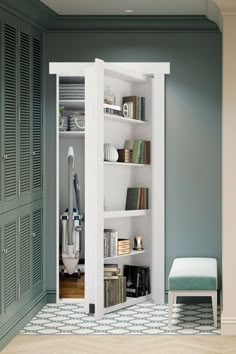 an open bookcase in the corner of a room with blue walls and wooden floors