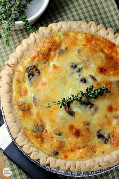 a cheese and mushroom pie on a table