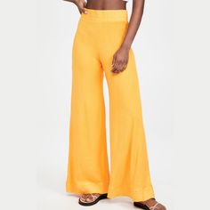 Brand New With Tags. Fabric: Mid-Weight French Terry High Rise Color: Yellow/Orange Covered Elastic Waistband Shell: 70% Cotton/30% Modal Wash Cold Inseam About 32” Size Xs Chic Mustard Wide Leg Pants, Chic Yellow Loungewear Pants, Chic Yellow Lounge Pants, Fitted Yellow Pants For Vacation, Chic Yellow Full-length Bottoms, Fitted Yellow Wide Leg Pants For Spring, Chic Yellow Wide Leg Bottoms, High Waist Yellow Pants For Summer, High Waist Yellow Pants For Vacation