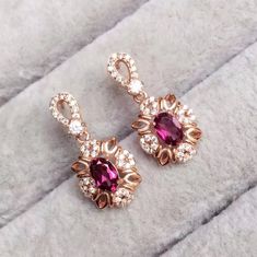 Welcome to Elegant Art Jewelry!  Stone: Natural Red Garnet Stone Size: ( Pendent: 6mm×8mm ), ( Ring: 6mm*8mm ), ( Earrings: 7mm*5mm ) Side Stone: Zircon Metal: 925 Sterling Silver Personalization: 9K/14K/24K/GOLD/SILVER/PLATINUM/ROSE-GOLD/WHITE GOLD. (Contact me)  Red Garnet Pendant, Red Garnet Cuff Pendant, 925 Sterling Silver Pendant, Oval Shape Pendant, Red Garnet Pendant, Red Garnet Engagement, Open Design Pendant, Red Garnet Oval, Emerald Red Garnet, Red Garnet, Red Gemstone, Gemstone Penda Garnet Jewelry Set, Red Garnet Jewelry, Red Garnet Necklace, Necklace Luxury, Platinum Rose Gold, Garnet Red, Garnet Pendant, Garnet Necklace, Victorian Rings