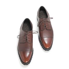 The Frank Cap Toe Derby in a handmade Chestnut patina is now available as a made-to-order shoe. To place your order with a 50% deposit, please use the code MTODEPOSIT during checkout. The balance will be collected before shipping your shoes. Reno grain calf leather Handmade chestnut patina Asymmetric design with no center back seam Bench made, Goodyear-welted construction Vibram Gumlite Commando Sole Quilted and padded insole Professionally hand finished before shipment Proudly made in Spain The Brown Calf Leather Cap Toe Derby, Brown Leather Cap Toe Monk Strap Shoes, Brown Leather Sole Cap Toe Derby, Brown Leather-lined Monk Strap Shoes For Business, Derby Shoe, Brown Leather-lined Monk Strap Shoes For Derby, Bespoke Shoes, Cream Shoes, Shoe Last