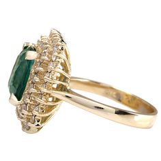 Stamped: 14K Yellow GoldTotal Ring Weight: 7.0 GramsRing Length: N/ARing Width: N/AGemstone Weight: Total Natural Emerald Weight is 3.87 Carat (Measures: 10.36x8.97 mm)Color: GreenDiamond Weight: Total Natural Diamond Weight is 1.40 CaratColor: F-G, Clarity: VS2-SI1Face Measures: 18.55x16.87 mmSku: [702657W] Formal Marquise Yellow Gold Emerald Ring, Fine Jewelry Oval Birthstone Ring, Formal Yellow Gold Cluster Birthstone Ring, Formal Cluster Yellow Gold Birthstone Ring, Cluster Emerald Ring In Yellow Gold With 17 Jewels, Formal Yellow Gold Cluster Ring With Emerald, 14k Gold Cluster Halo Ring For Formal Occasions, Formal 14k Gold Cluster Halo Ring, Oval Stamped 14k Halo Ring Fine Jewelry