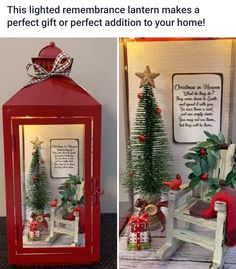 a red lantern sitting next to a small christmas tree in a glass case on top of a table