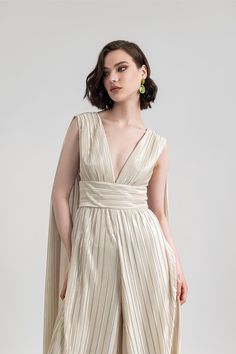 Description Beige Jumpsuit, Long dress Sleeveless Plunging neckline Dry Clean Evening Dress Made in Lebanon EDR23 1800JMP Beige Jumpsuit, Pants Jumpsuit, Jumpsuit Long, Wide Pants, Dress Sleeveless, Plunging Neckline, Lebanon, Brunei, Evening Dress