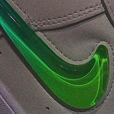 a close up view of a green shoe