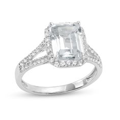 Elevate your look with this emerald-cut white lab-created sapphire split shank ring, a shimmering style that pairs well with most any attire. Fashioned in sterling silver This design glistens with a 9.0 x 7.0mm emerald-cut white lab-created sapphire. Dainty round white lab-created sapphires line the frame and the split shank for extra sparkle. This ring is available in size 7 only. Split Shank Ring, White Lab, Peoples Jewellers, Split Shank, Emerald Stone, Sapphire Stone, Elevate Your Look, White Metal, Emerald Cut