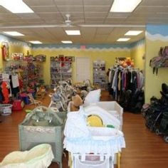 a baby shop filled with lots of clothes and toys