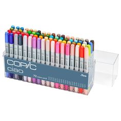 a display case filled with lots of different colored crayon pens on top of each other