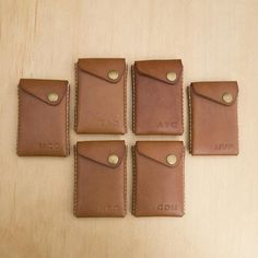 Your Groomsmen will love these personalized 'Card Trick' card cases.  Perfect to use as a business card case or slim wallet.  An enduring and personal memento of the day they celebrated with you.  These wallets will last for many years to come, and like your friendship, just get better with age.FREE MONOGRAMMING on gift sets (Usually an additional $5.00/wallet) + FREE AIRMAIL SHIPPING TO ANYWHERE IN THE WORLD!!! (3-10 working day target to most destinations)Each wallet can be personalized with a Rectangular Cases With Card Slots For Personal Use, Classic Card Holder With Id Window As Gift, Classic Rectangular Trifold Wallet For Personal Use, Personalized Bifold Card Holder With Card Slots, Personalized Rectangular Trifold Wallet, Classic Personalized Wallets, Classic Rectangular Cases With Card Slots, Classic Card Holder For Personal Use, Classic Card Holder With Interior Slots For Personal Use