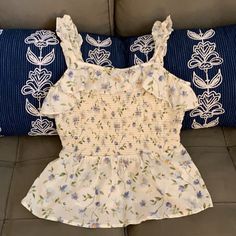 Bought This Year And Never Worn. No Defects - Super Cute. Pet Free Smoke Free Home. Beach Smocked Cotton Top With Ruffles, Summer Cotton Smocked Top With Floral Print, Beach Smocked Top With Ruffles In Cotton, Cotton Smocked Ruffle Top For Beach, Cotton Smocked Top With Ruffles For Vacation, White Smocked Top With Ruffled Straps For Spring, White Cotton Smocked Top With Floral Print, White Sleeveless Smocked Top With Floral Print, White Smocked Top With Ruffled Straps