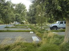 a truck parked in the middle of a park