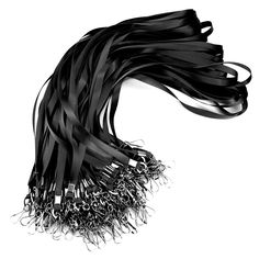 a black and white photo of a long, wavy piece of hair with metal strands