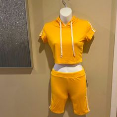 2-Pc Set: Biker Shorts W/Hooded Crop Top. Size Medium, Golden Yellow W/White Stripes On Side. Tags Still Attached. Brand New, Never Worn. Sporty Yellow Biker Shorts, Casual Yellow Fitted Biker Shorts, Casual Fitted Yellow Biker Shorts, Lululemon Biker Shorts, Biker Baby, Hooded Crop Top, Red Pocket, Bicycle Shorts, Baby Shorts