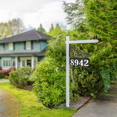 a house with a sign in front of it