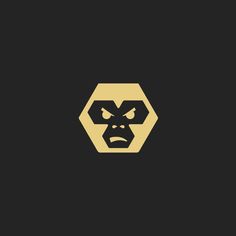 an angry looking gorilla face in the middle of a hexagonal shape with two eyes