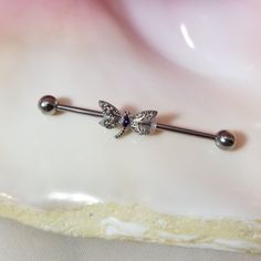 This is a brand new, handmade industrial barbell with dragonfly charm.  Dragonfly has purple CZ gem. Barbell size is 1 1/2" with 5mm balls.   Both balls unscrew.  Barbell is 316L surgical grade steel.  If you have any questions, please let me know. Cute Industrial Piercing, Bar Ear Piercing, Industrial Bar Piercing, Industrial Piercing Jewelry, Ear Cuff Jewelry, Industrial Jewelry, Industrial Barbell, Industrial Piercing, Dragonfly Charm