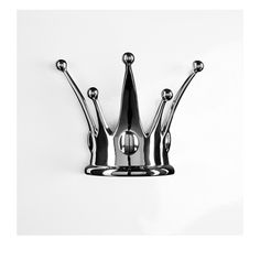 a metal crown on a white background