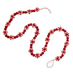 a red and white beaded necklace with beads