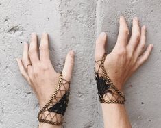 Lace bracelet REFRACTION Thumb chain handlet slave bracelet | Etsy Bone Hand Bracelet, Hands Full Of Bracelets, Viking Arm Ring Bracelet, Hand Strung Necklaces, Handmade Chain Bracelets, Beaded Slave Braclets Ring Bracelet, Slave Braclets Ring Bracelet, Large Statement Earrings, Lace Bracelet