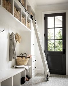 the entryway is clean and ready to be used as a storage area for shoes