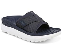 Ahhh, sweet relief. That's what you'll get when you slip your tired tootsies into these unisex recovery sandals. The sporty slides feature a soft neoprene upper with an adjustable hook-and-loop cross strap and a cushioned lining for maximum comfort and support.  Offering a fashion-forward take on recovery footwear, these shoes pair well with your casual and athleisure looks. Wear them after a low-impact workout, while you're walking the dog, or when you're padding around the house on a lazy Sund Recovery Sandals, Athleisure Looks, Walking The Dog, Surgery Recovery, Clog Slippers, Low Impact Workout, Cross Straps, Dog Walking, Slide Sandals