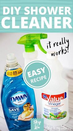 a bottle of dishwasher cleaner next to two bottles of detergent and a sign that says it really works