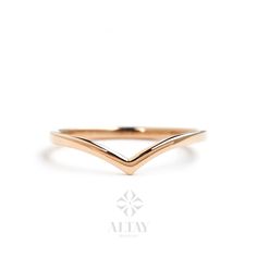 ABOUT PRODUCT This 14K Gold Chevron Ring is suitable gift for girlfriend, mom and her. You can even buy as a birthday gift for your friends or anniversary gifts, If you want to add a special note we can write for you and put to inside of package. We manufacture our jewelry pieces with carefully and after production we double checking in quality control department. Our main idea is keep our items for daily wearing especially for minimalist jewelry pieces. 14K Gold Chevron Ring, V Ring, Gold Curve Simple Design Bands As A Gift, Minimalist Bands With Polished Finish As Gift, Minimalist Open Band Gift Bands, Gold V Ring, V Shaped Stacking Ring, V Shape Ring Gold, Chevron Gold Ring, Minimalist Curved Yellow Gold Ring, Gold Chevron Ring