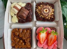 four different types of chocolates in a box with strawberries and almonds on the side