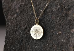 "Compass necklace, compass pendant, compass jewelry, 14K solid gold necklace, compass charm, compass gift, personalized compass pendant, necklace for woman, necklace for man, custom pendant, traveler gift * Material: Pendant and chain are 14k Yellow Solid Gold * Pendant thickness: 0.70 mm * Inner diameter of jump ring: 4 mm * Pendant diameter: 0.55 inch (14 mm) 0.60 inch (15.30 mm) 0.65 inch (16.50 mm) 0.70 inch (17.78 mm) 0.75 inch (19.10 mm) * Chain length: 14 inch (35 cm) 16 inch (40 cm) 18 i Compass Design Pendant Jewelry As Gift, Compass Design Pendant Jewelry Gift, Compass Design Pendant Charm Necklace As Gift, Minimalist Compass Design Jewelry As Gift, Compass Design Round Necklace, Compass Design Medallion Jewelry As Gift, Round Compass Design Charm Necklace As Gift, 14k Gold Compass Design Jewelry Gift, Gift Charm Necklace With Compass Design